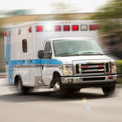Ambulance rushing to the scene of a motor vehicle accident